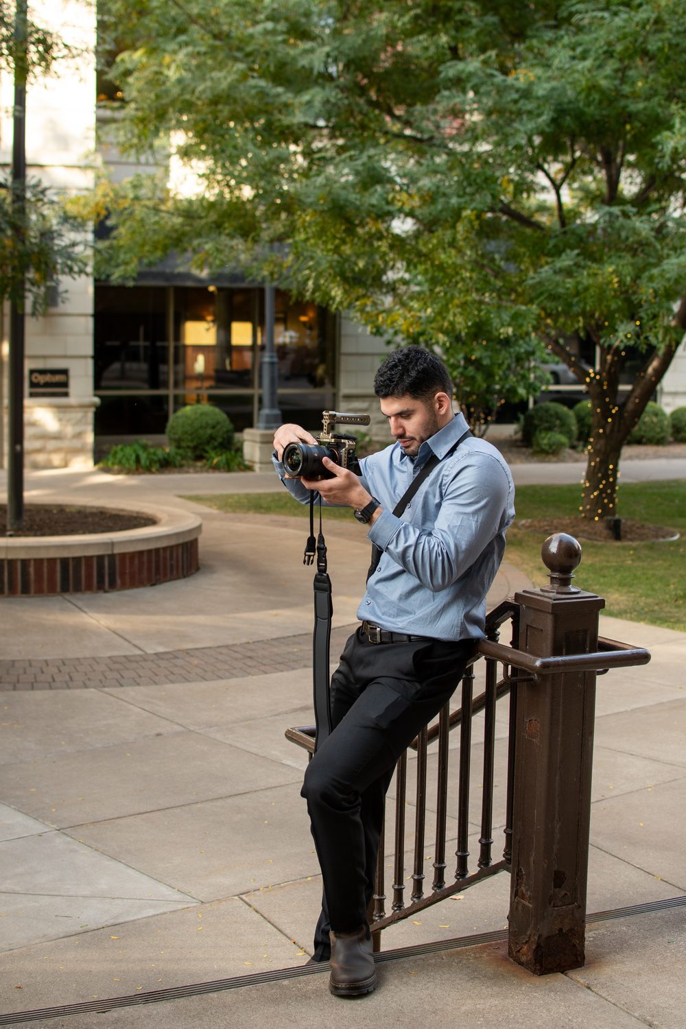 Elias checking camera settings between wedding moments
